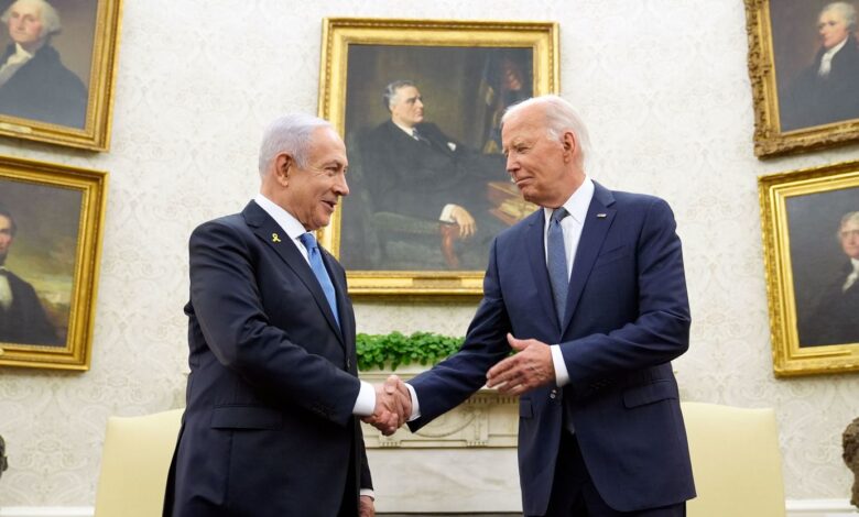 On Thursday, July 25, President Joe Biden (right) and Israeli Prime Minister Benjamin Netanyahu (left) shake hands in the Oval Office at the White House in Washington, DC. Photo by Susan Walsh/AP.