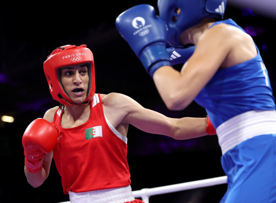 Imane Khelif of Algeria celebrates her first Olympic victory after Italian opponent Angela Carini withdrew from their match in the Women's 66kg Round of 16 at the 2024 Summer Olympics, at Villepinte, France, on August 1, 2024. (Richard Pelham / Getty Images)