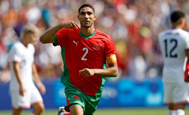 Achraf Hakimi of Morocco celebrates his team’s third goal against the USA at the Parc des Princes in Paris [Aurelien Morissard/AP].