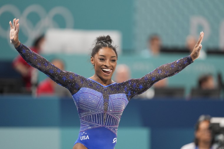 Simone Biles beams with joy following her balance beam routine at the women’s artistic gymnastics all-around finals held at Bercy Arena during the 2024 Summer Olympics in Paris, France, on Thursday, August 1, 2024. (Photo by Francisco Seco / AP)