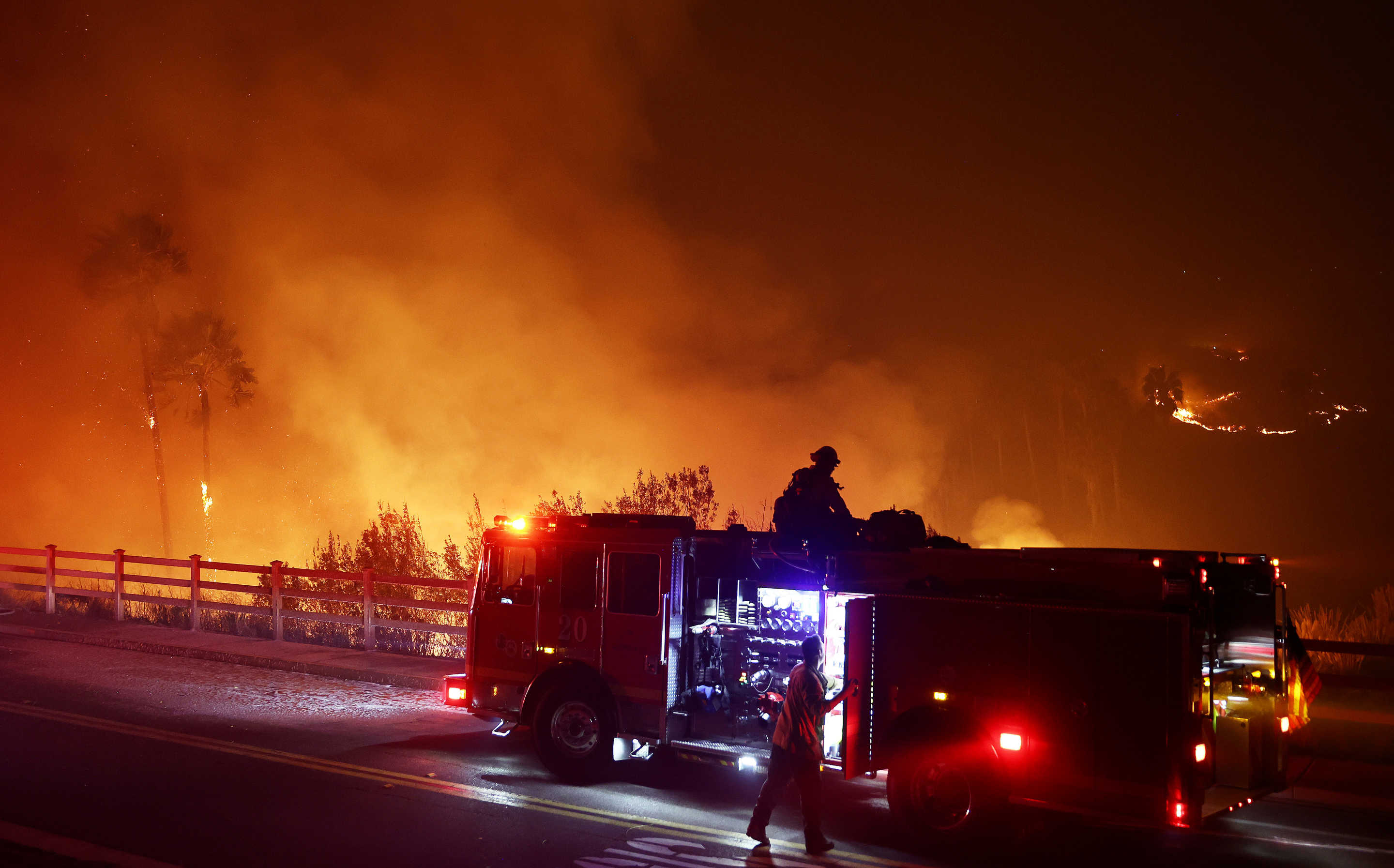 Firefighters at work Tuesday 10 Dec 2024. (Mario Tama/Getty Images)