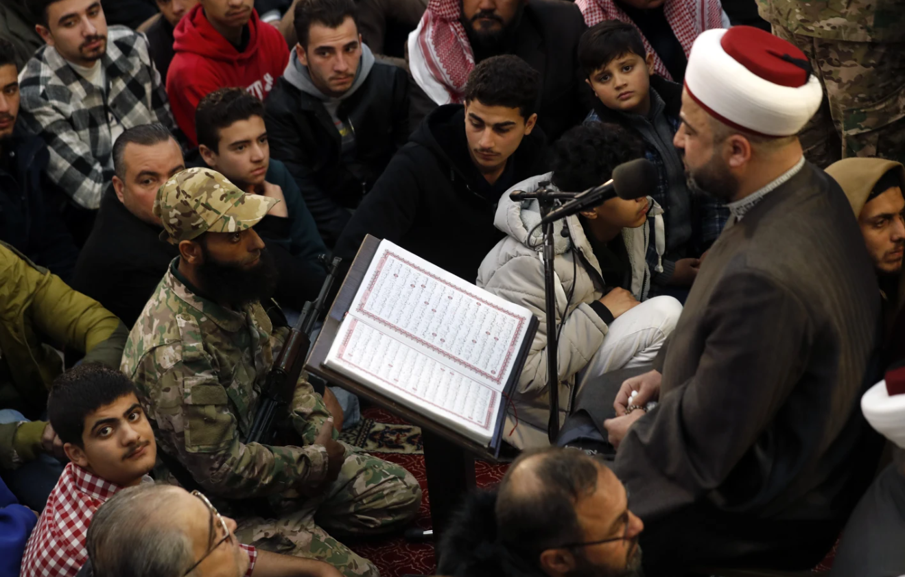 Syrians gather to hear a Muslim cleric during Friday prayers at the historic 7th-century Umayyad Mosque in Damascus, Syria, on Friday, Dec. 13, 2024. (AP Photo/Omar Sanadiki)