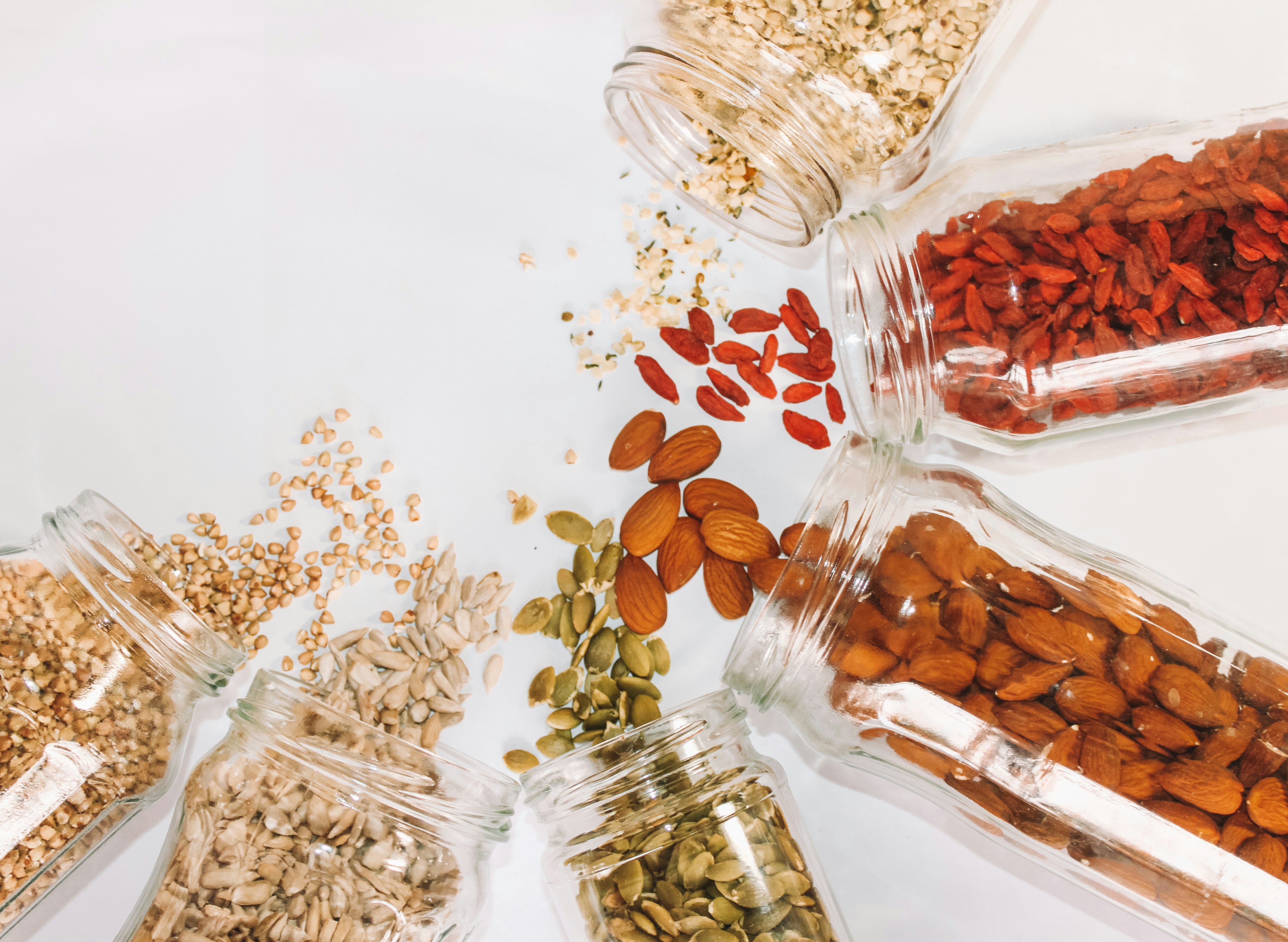 Nuts and seeds contain many vitamins, including: biotin, pantothenic acid, thiamine, calcium, iron, magnesium, manganese, molybdenum, and selenium 