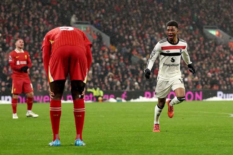 Amad Diallo of Manchester United sprints away in celebration after scoring his team's second goal [Carl Recine/Getty Images]