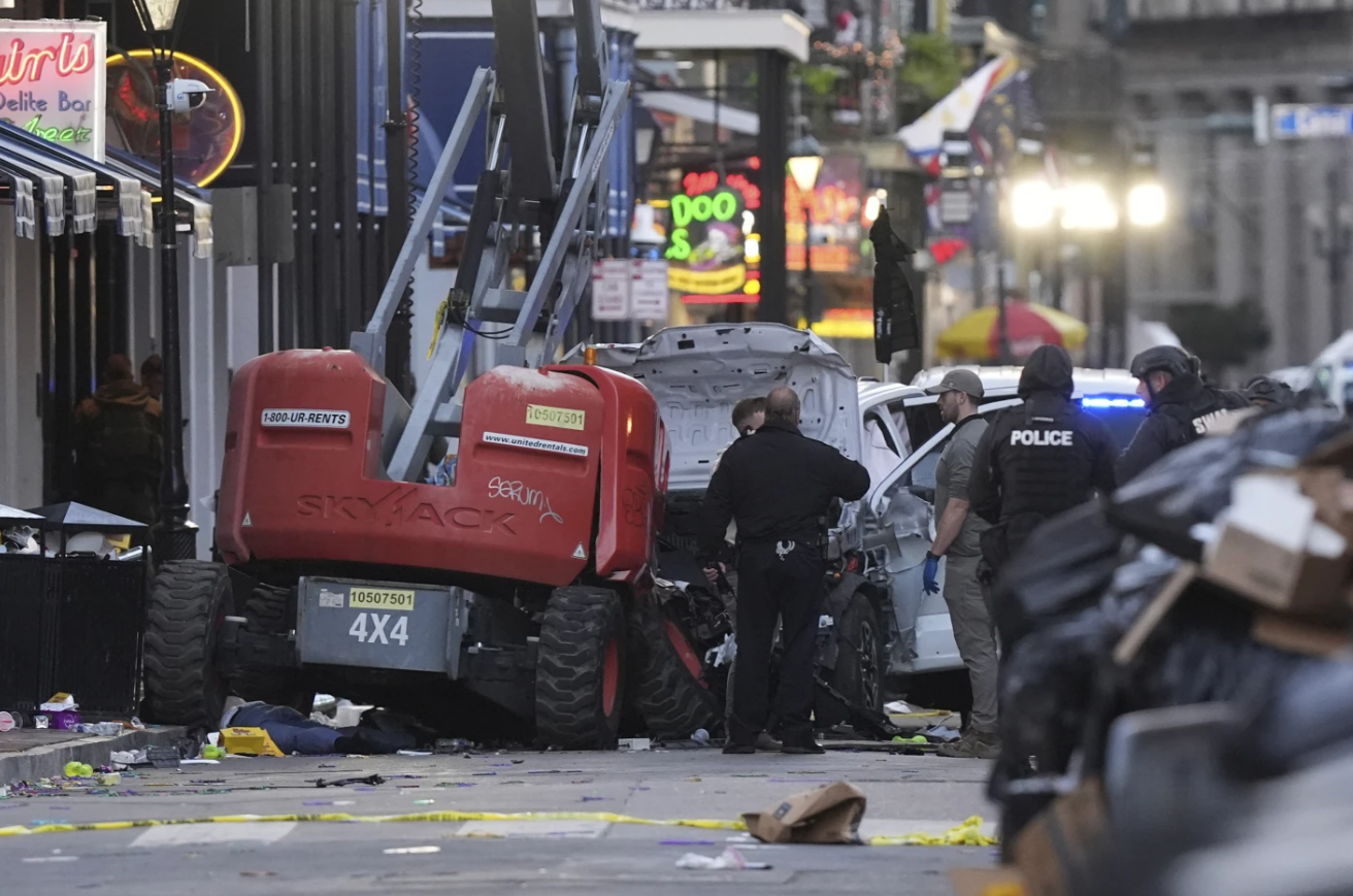 Security inspects Bourbon Street after a vehicle attack on Jan. 1, 2025. (AP Photo/Gerald Herbert)