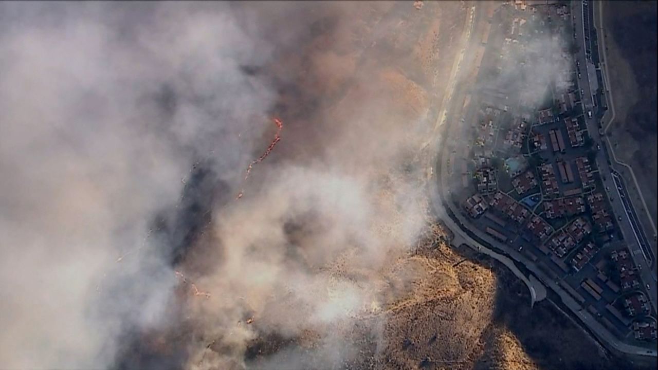 Aerial View: Kenneth Fire Threatens Nearby Residential Areas. KABC