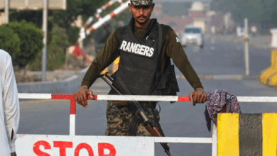 A Pakistani paramilitary soldier stands guard at a checkpoint in Wagah, the joint border crossing between Pakistan and India, near Lahore on Wednesday. AP
