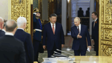 Chinese President Xi Jinping and Russian President Vladimir Putin enter the venue of their talks at the Kremlin in Moscow, Russia, on May 8, 2025