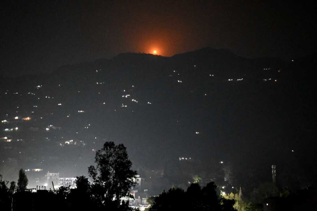 A flare lights up the sky near Poonch, India, on Wednesday as India claims it struck terrorist camps in Pakistan and Pakistan-administered Kashmir following a deadly attack in Indian-administered Kashmir. Getty Images