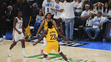 Indiana Pacers guard Tyrese Haliburton celebrates with forward Aaron Nesmith after making a 3-pointer during the second half.